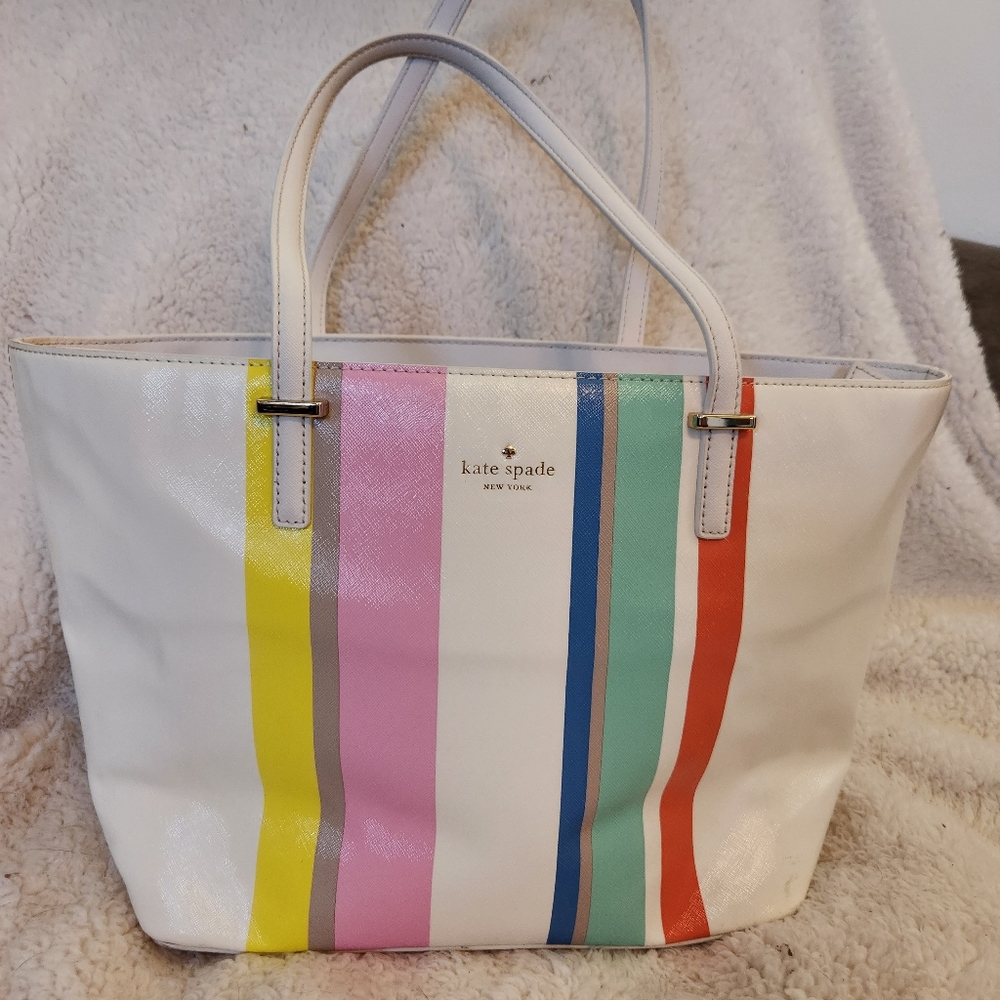 Kate Spade cream tote bag w/ pink, blue, green, orange, yellow and purple stripe